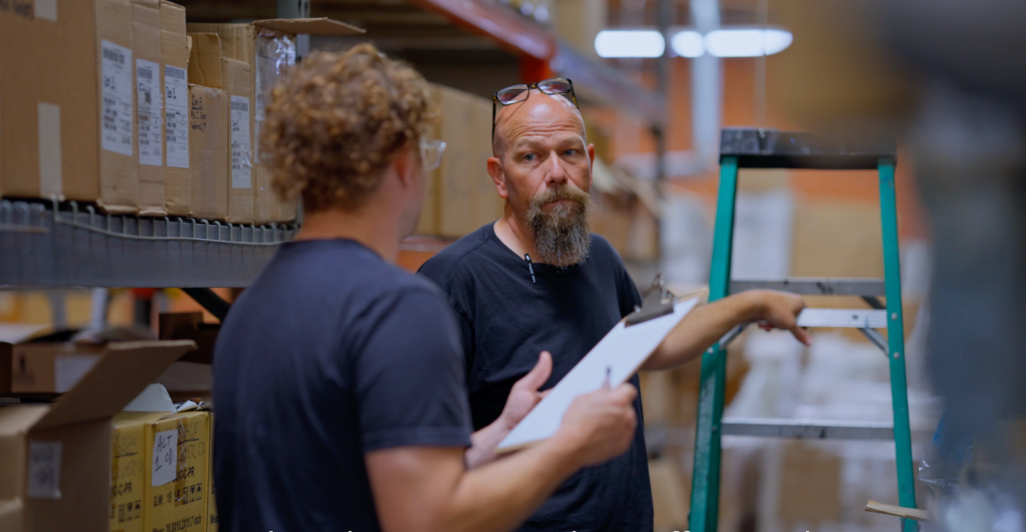 ChannelDock team discussing warehouse layout and section structure with a customer